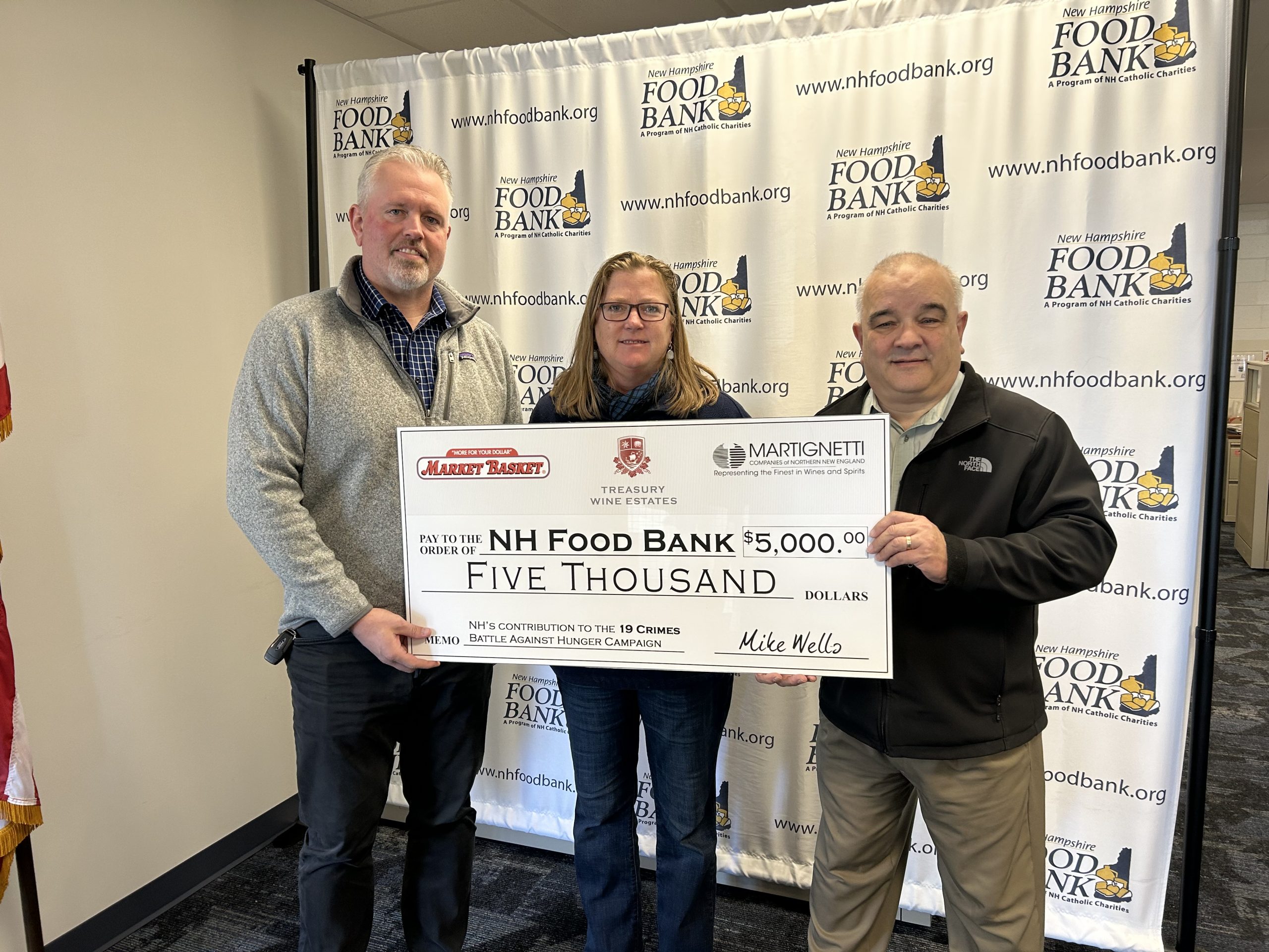 $5000 check presented to the NH Food Bank | NH Wines
